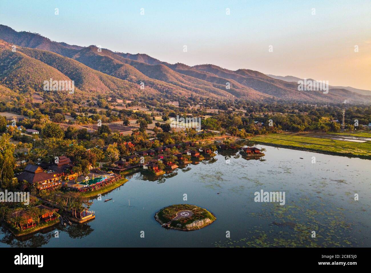 Myanmar, Shan State, Nyaungshwe Township, Aerial view of town on shore of Inle lake at dusk Stock Photo