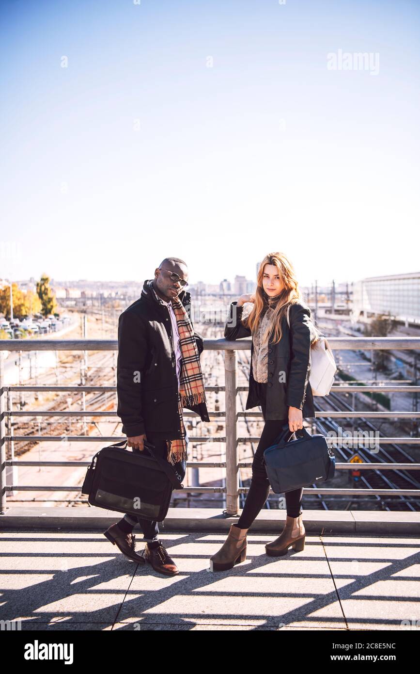 People Standing Behind Railing Railing people hi-res stock photography and images - Alamy