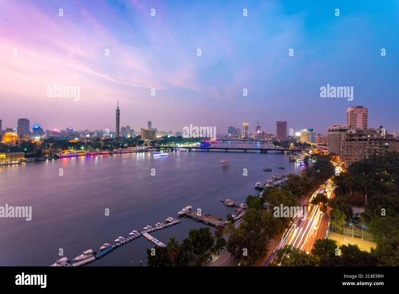 Egypt, Cairo, Nile with Cairo Tower on Gezira Island at dusk Stock Photo