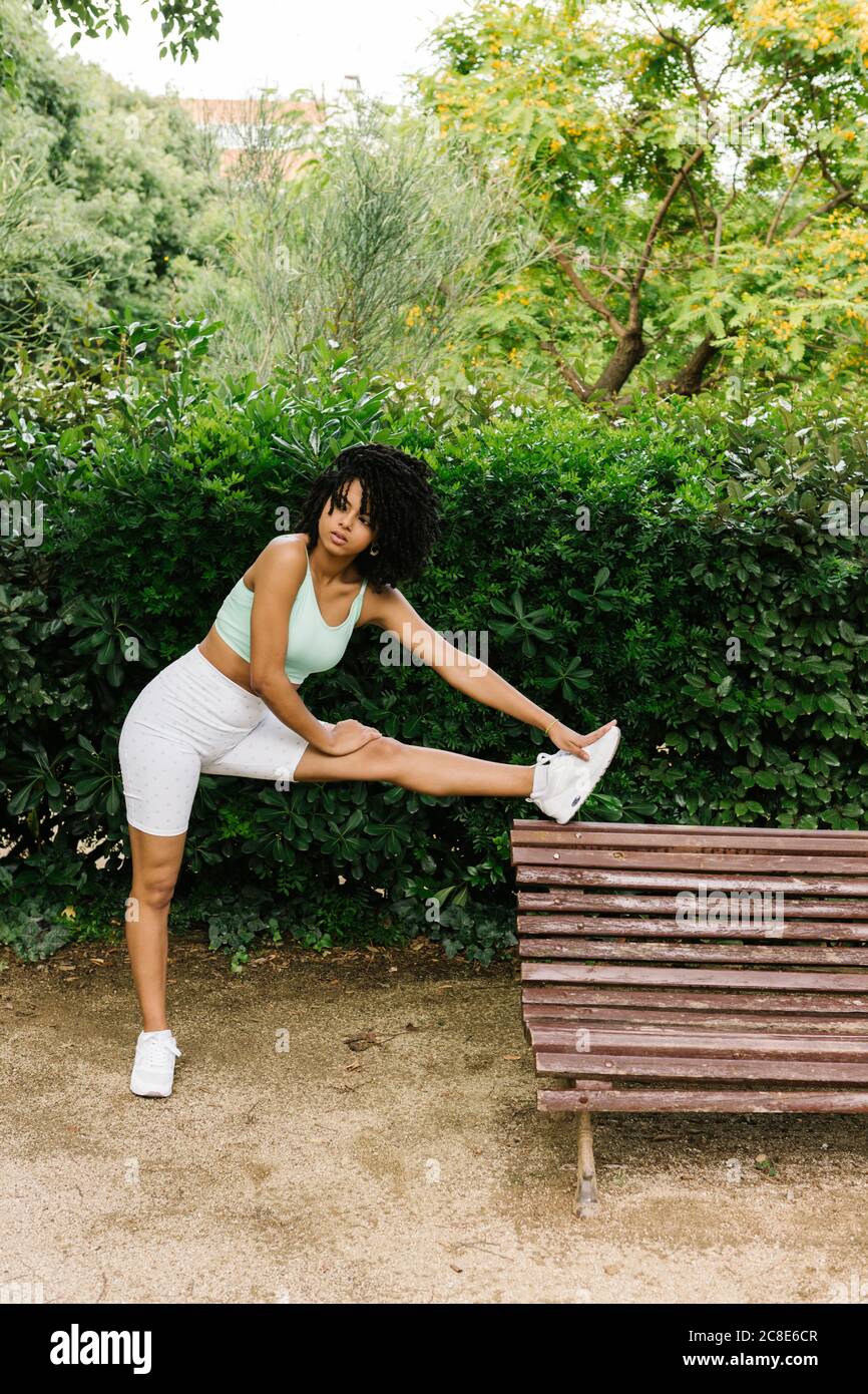 Athletic woman stretching leg hi-res stock photography and images - Alamy