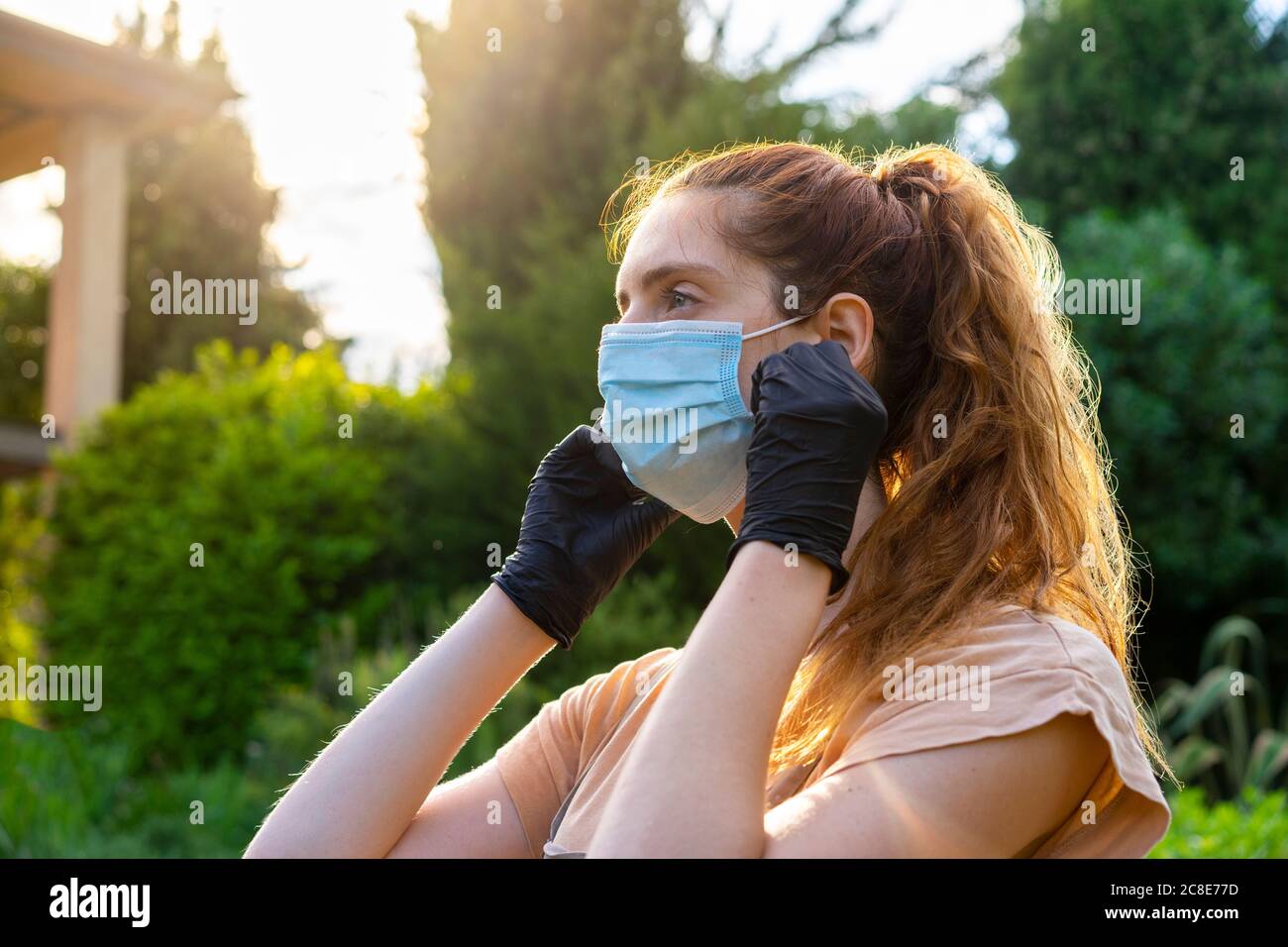 Wearing safety gloves hi-res stock photography and images - Alamy