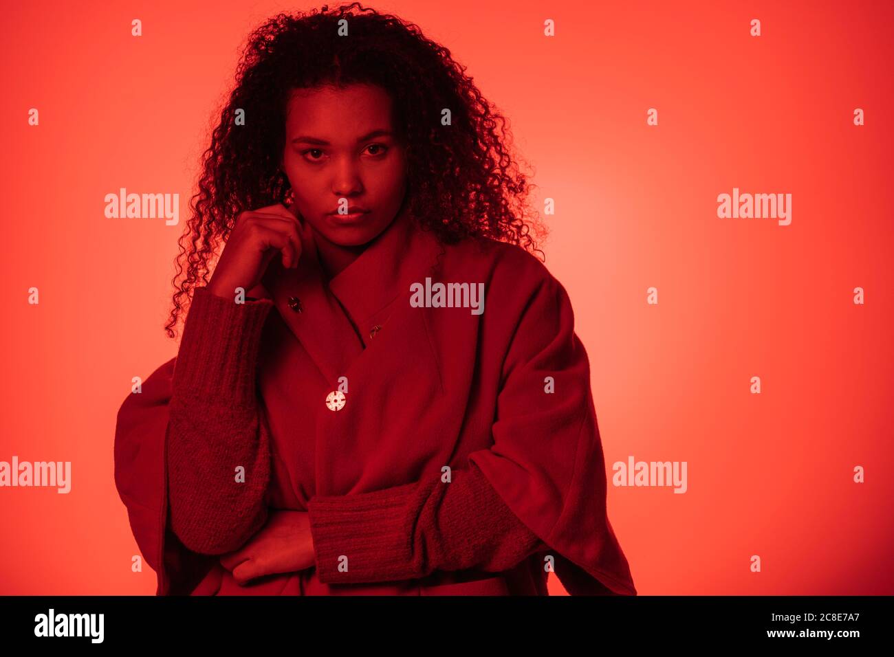 Person in orange coat hi-res stock photography and images - Alamy