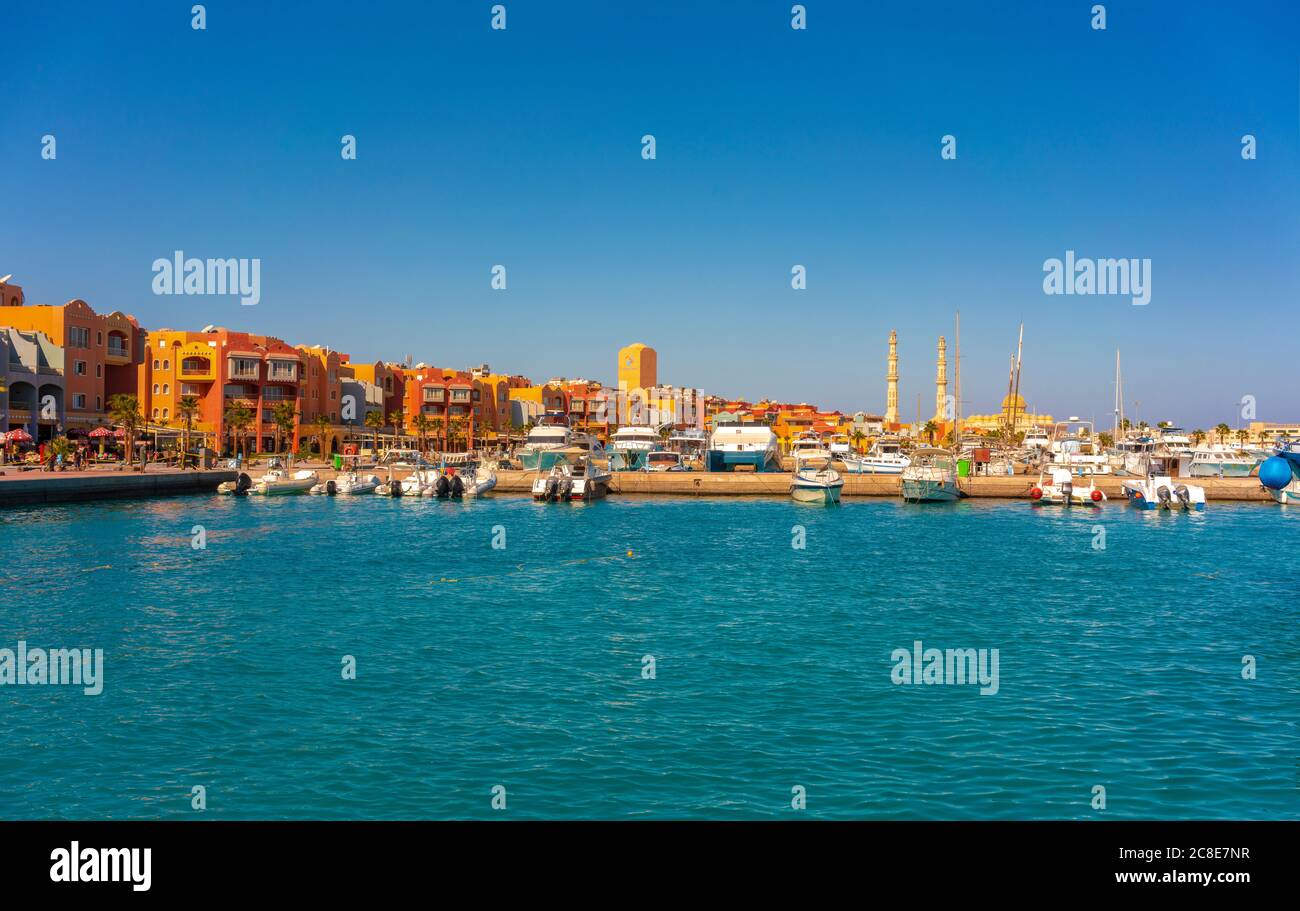 Egypt, Red Sea Governorate, Hurghada, Boats moored in harbor of seaside city Stock Photo
