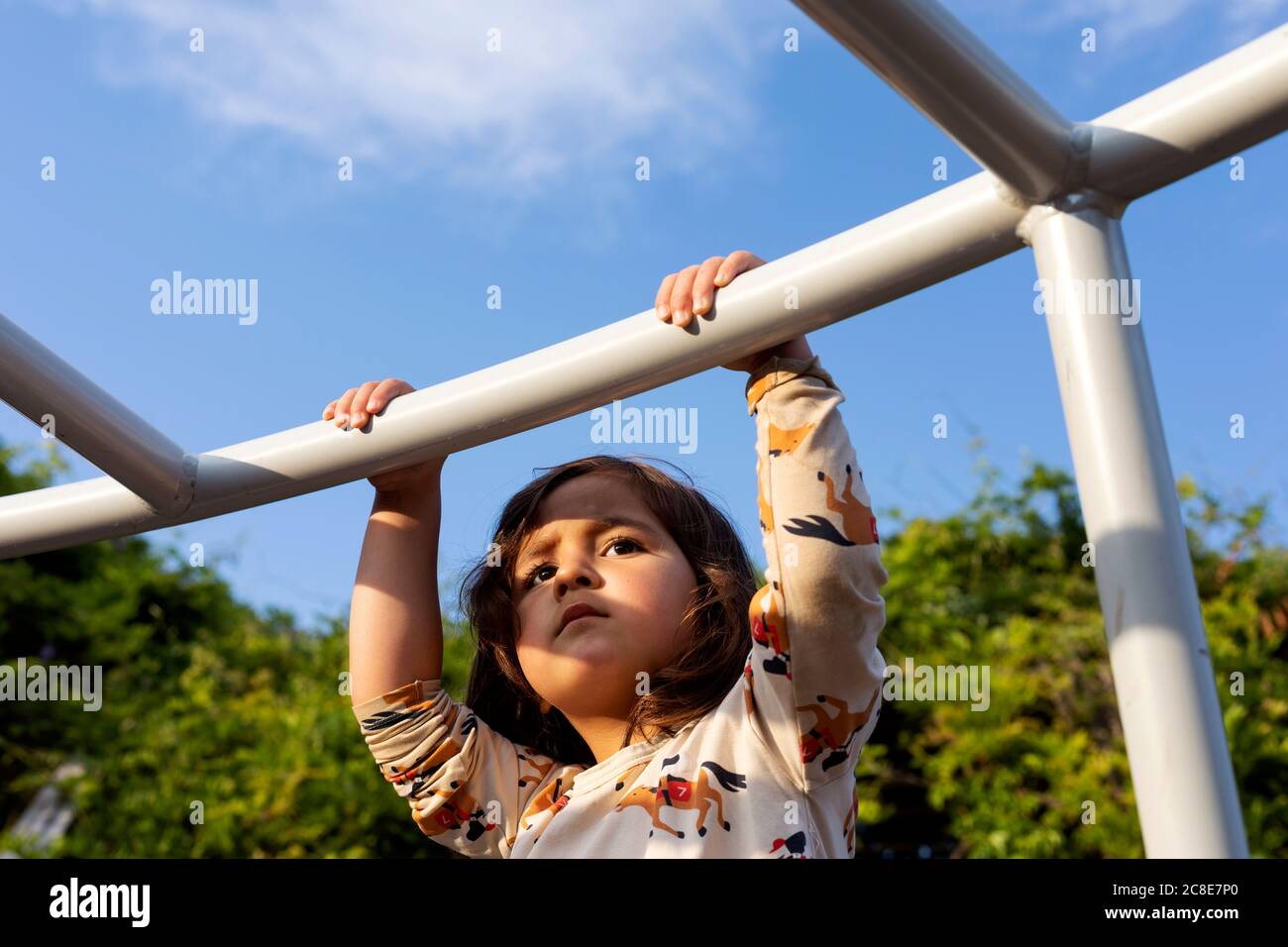 Portrait of little girl on playground Stock Photo - Alamy