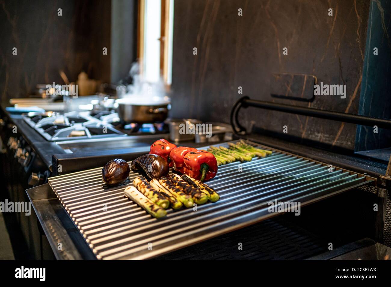 Grilled vegetables in restaurant kitchen Stock Photo