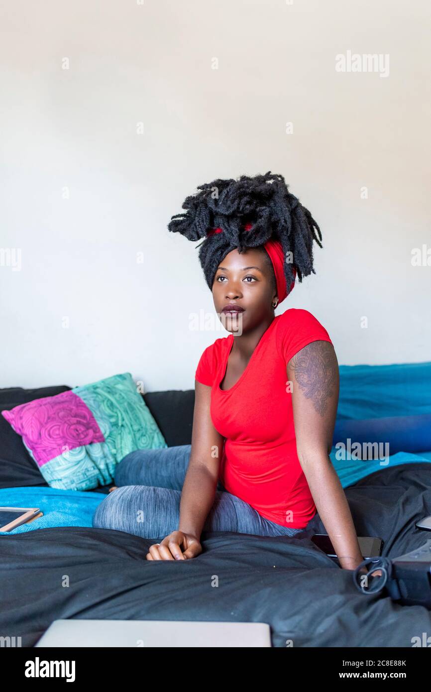 Serious black woman dreadlocks hi-res stock photography and images - Alamy