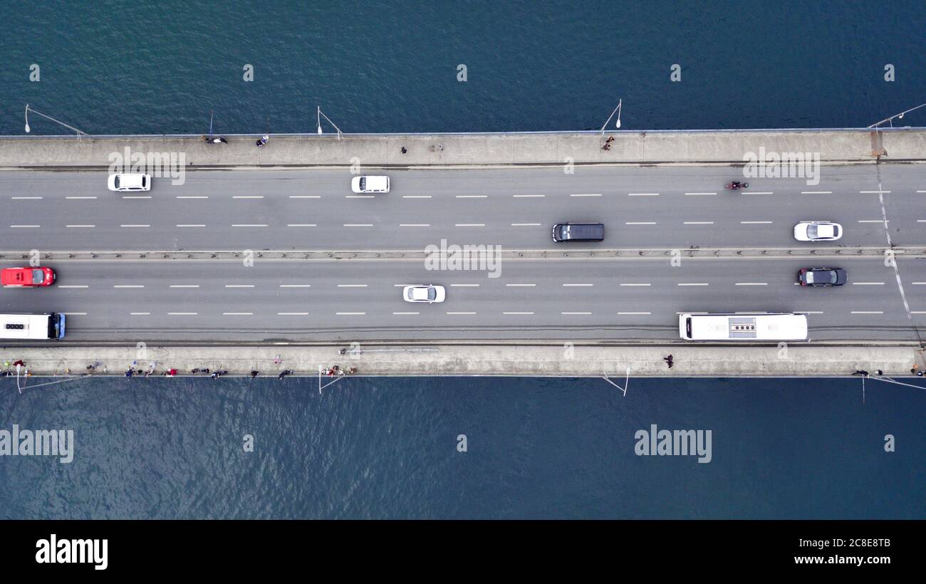 aerial view of the galata bridge at İstanbul. there is a metro station at the left bridge and the right one is galata bridge. also vehicles and cargo Stock Photo