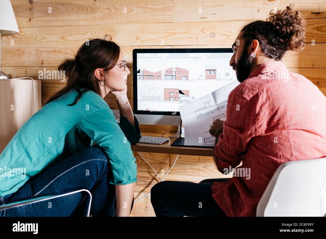 Young architects couple working at home Stock Photo