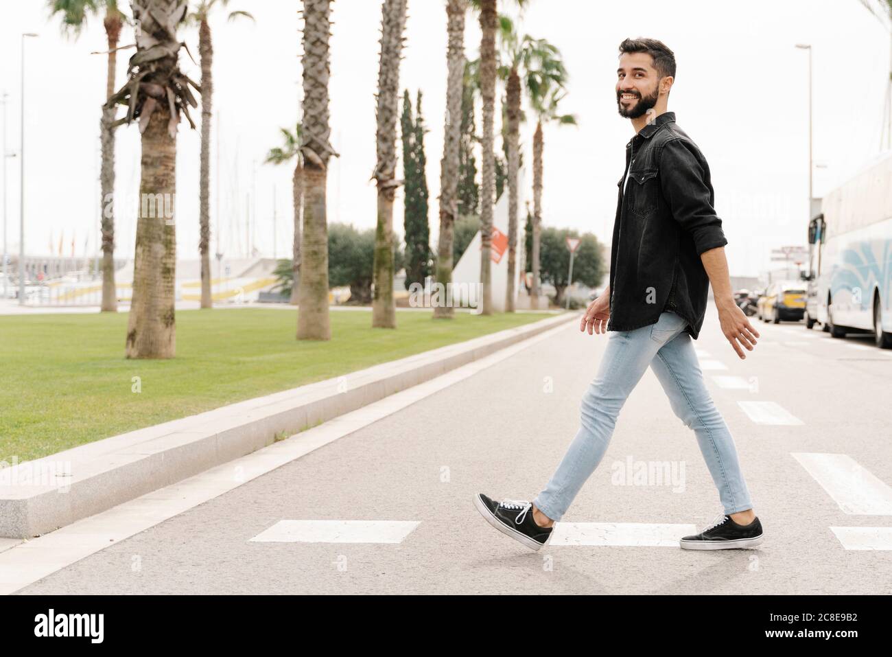 Attractive young man walking in hi-res stock photography and images - Alamy