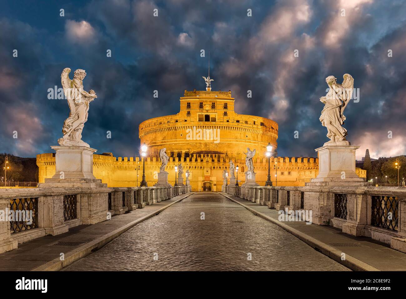Italy, Rome, Castel Sant Angelo and Ponte Sant Angelo at sunset Stock Photo