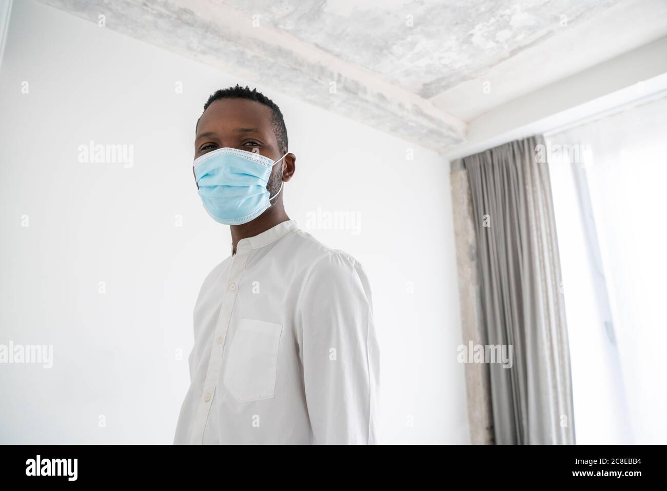 Man wearing mask face portrait hi-res stock photography and images - Alamy