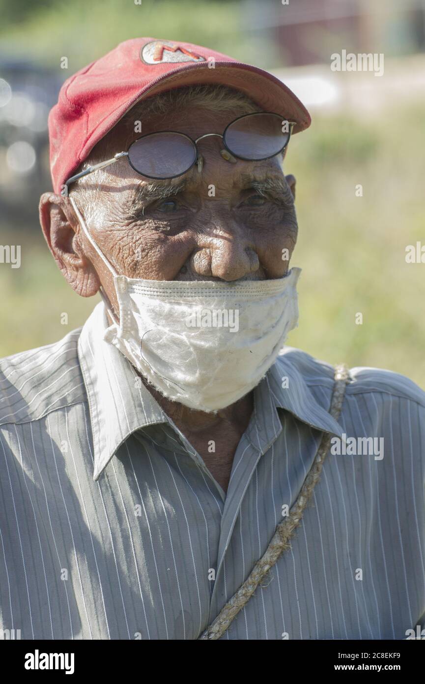 Jarabacoa ,La Vega / Dominican Republic - July 20, 2020 : a Dominican man more than one hundred years old using protective mask during covid-19 pandem Stock Photo