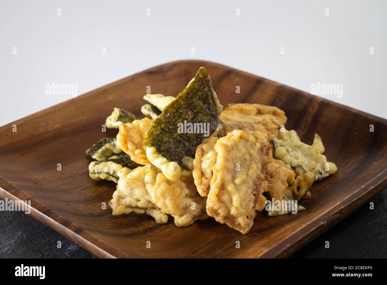 Japanese convenience store snack of fried seaweed and tempura in a