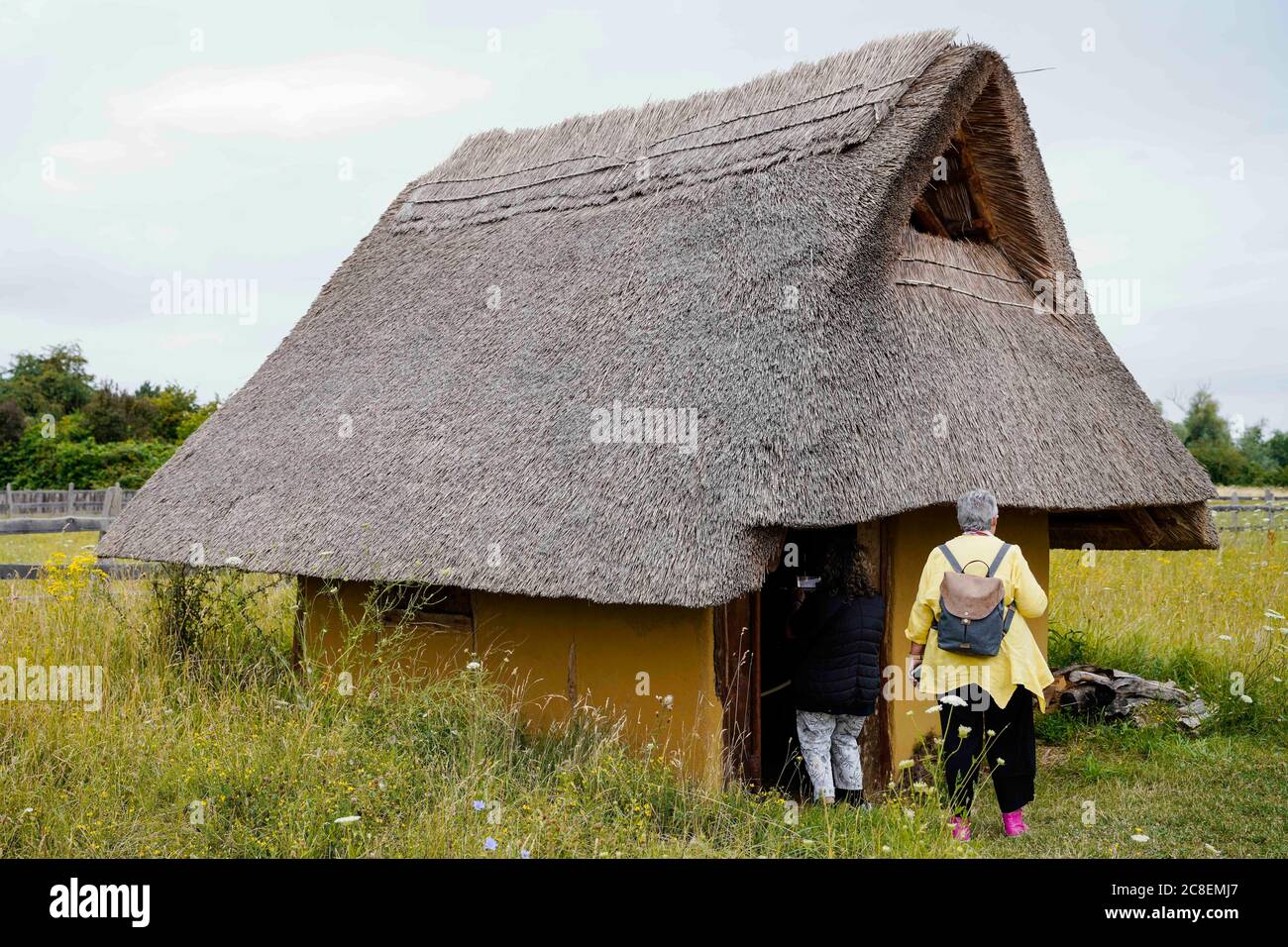 Lorsch, Germany. 08th July, 2020. Visitors to the Lauresham open-air  laboratory can view a replica of a pit house from the Carolingian period.  On an area of around four hectares, life and