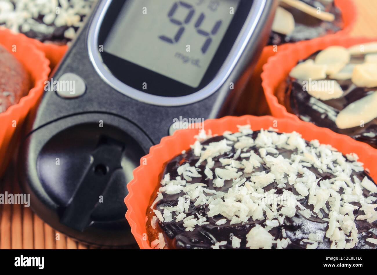 Glucometer for checking sugar level and fresh baked homemade chocolate ...