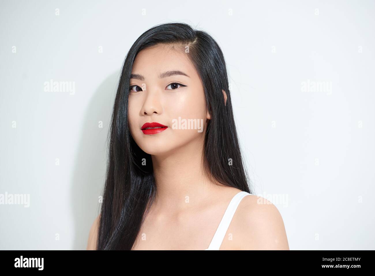 portrait of a beautiful asian girl with a serious face Stock Photo