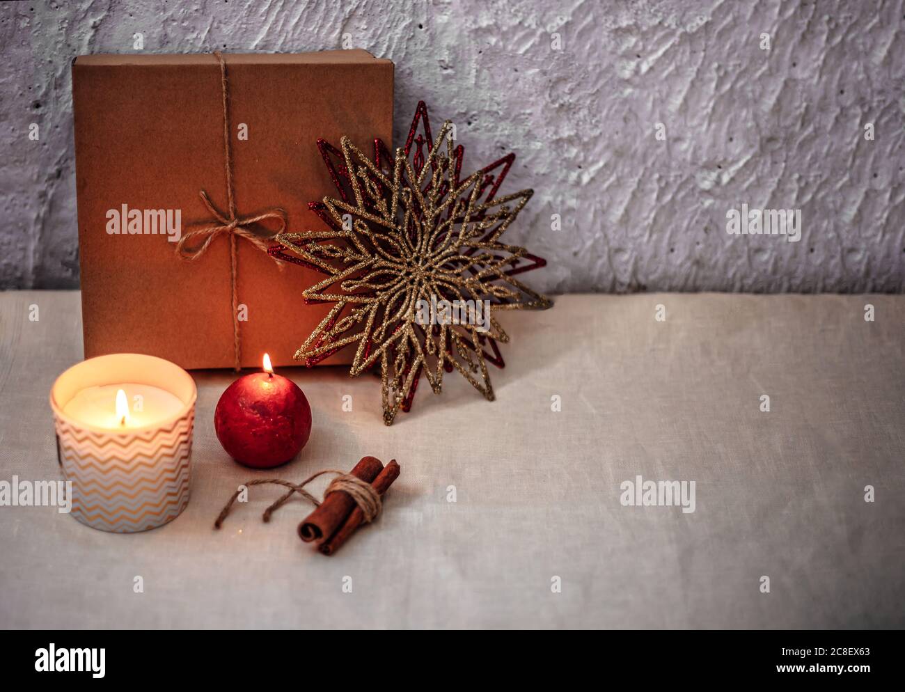 Christmas or new year composition. Christmas decorations in gold and red colors with copy space for text. Stock Photo