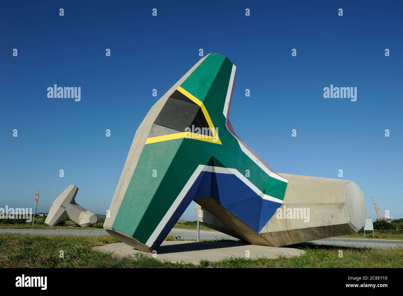 Breakwater dolos concrete blocks painted in SA national flag colours in