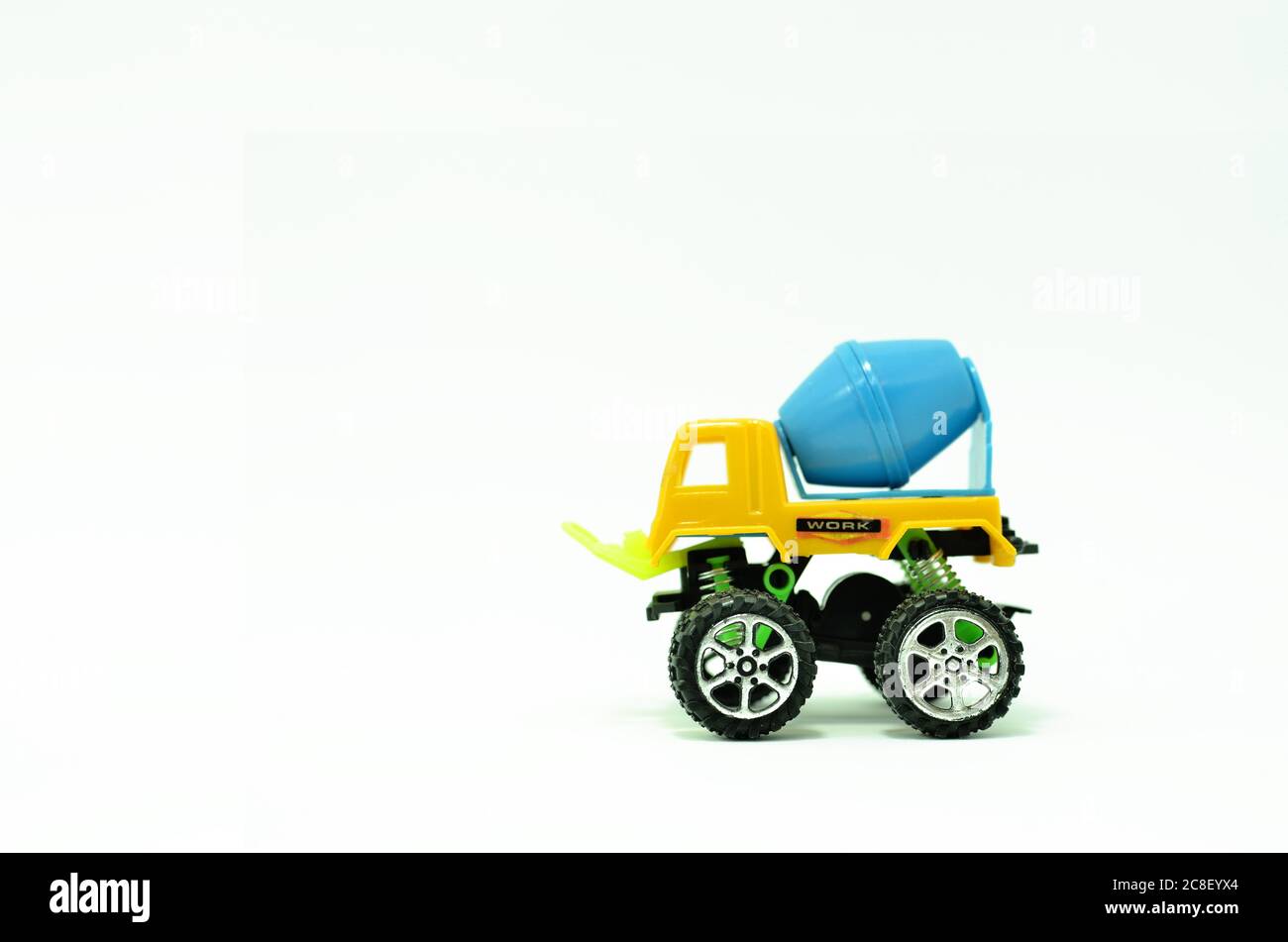 colorful truck cement (concrete) mixer plastic toy isolated on white background Stock Photo