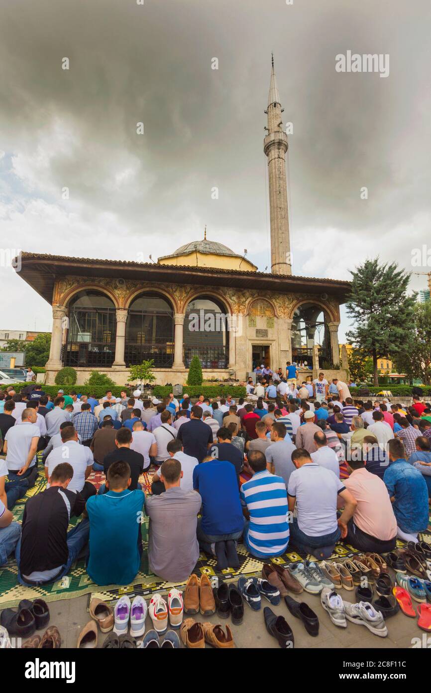 Tirana, Tirana County, Albania.  Congregation gathering before prayers at the Et'hem Bey mosque. Stock Photo