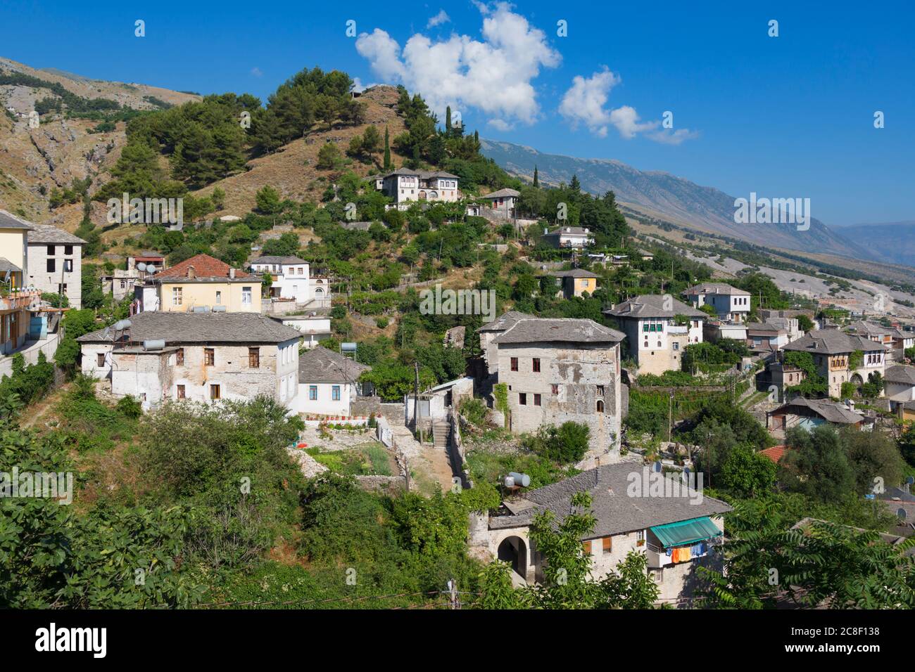 Gjirokastra or Gjirokaster, Albania.  Typical traditional property on edge of old town. Gjirokastra is a UNESCO World Heritage Site. Stock Photo