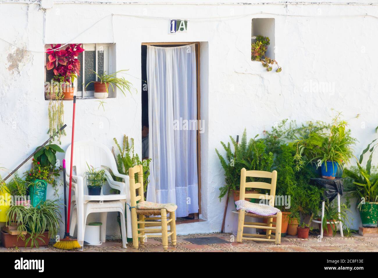 Front of typical house in Plaza Santo Cristo, Marbella, Costa del Sol, Malaga Province, Andalusia, southern Spain. Stock Photo