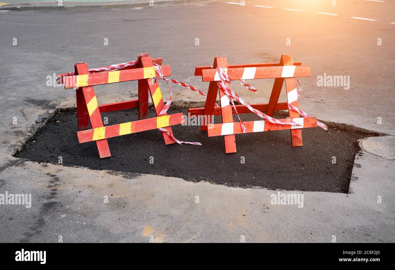 fencing signs road repair in the city Stock Photo