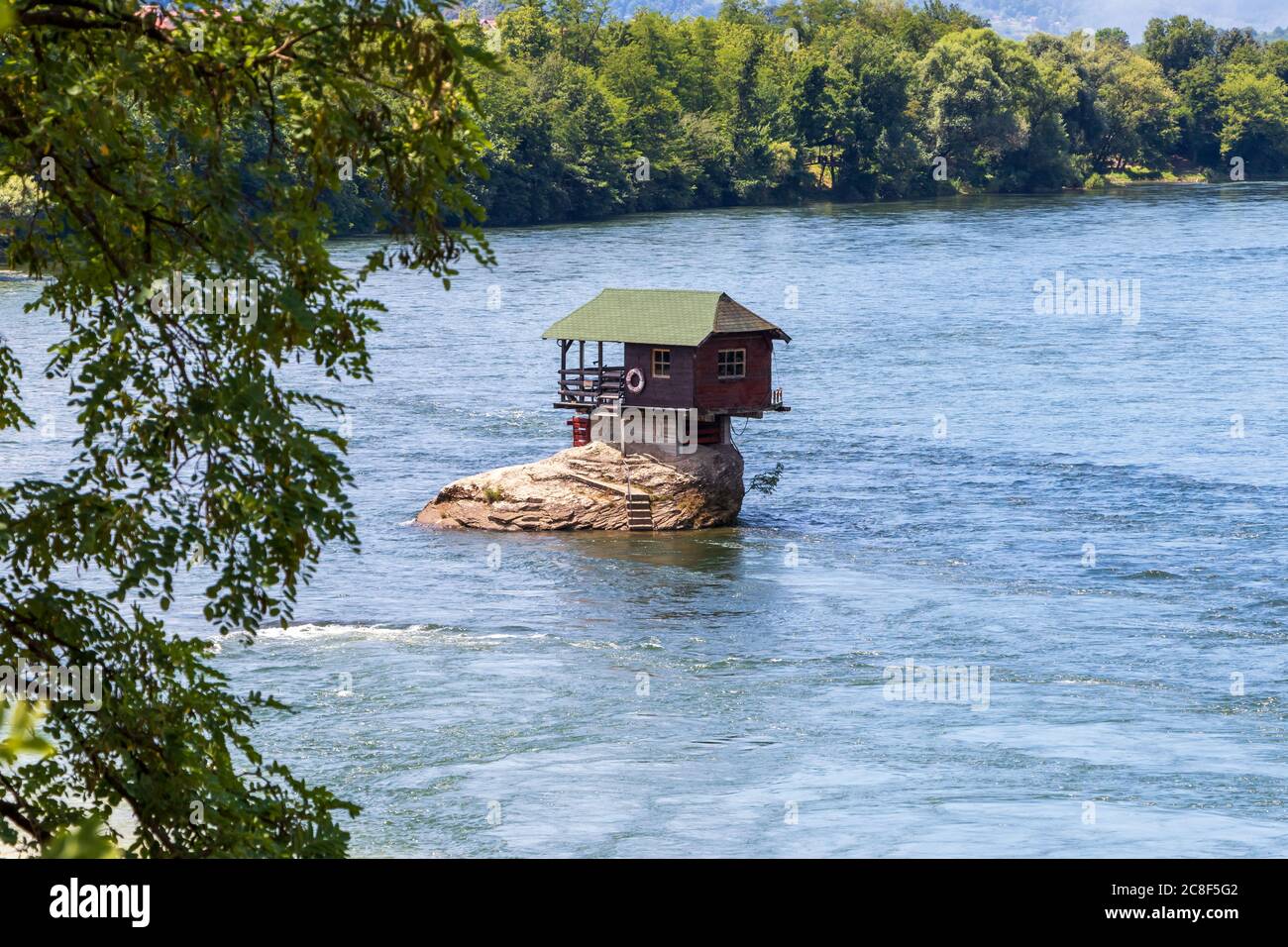 Small house on the river Drina in Bajina Basta, Serbia Stock Photo