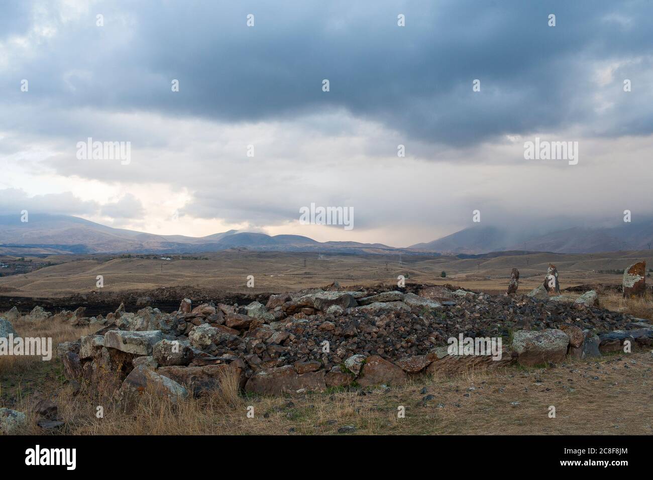 Carahunge, set on a dramatic plain, is a prehistoric archaeological site near the town of Sisian in the Syunik Province of Armenia. Stock Photo