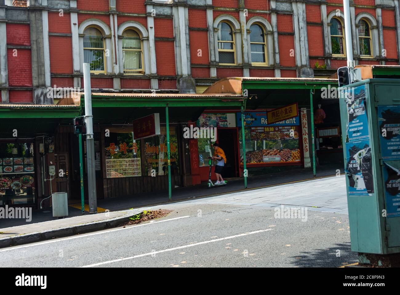 row of red brick shops on Queen Street, Auckland Stock Photo Alamy