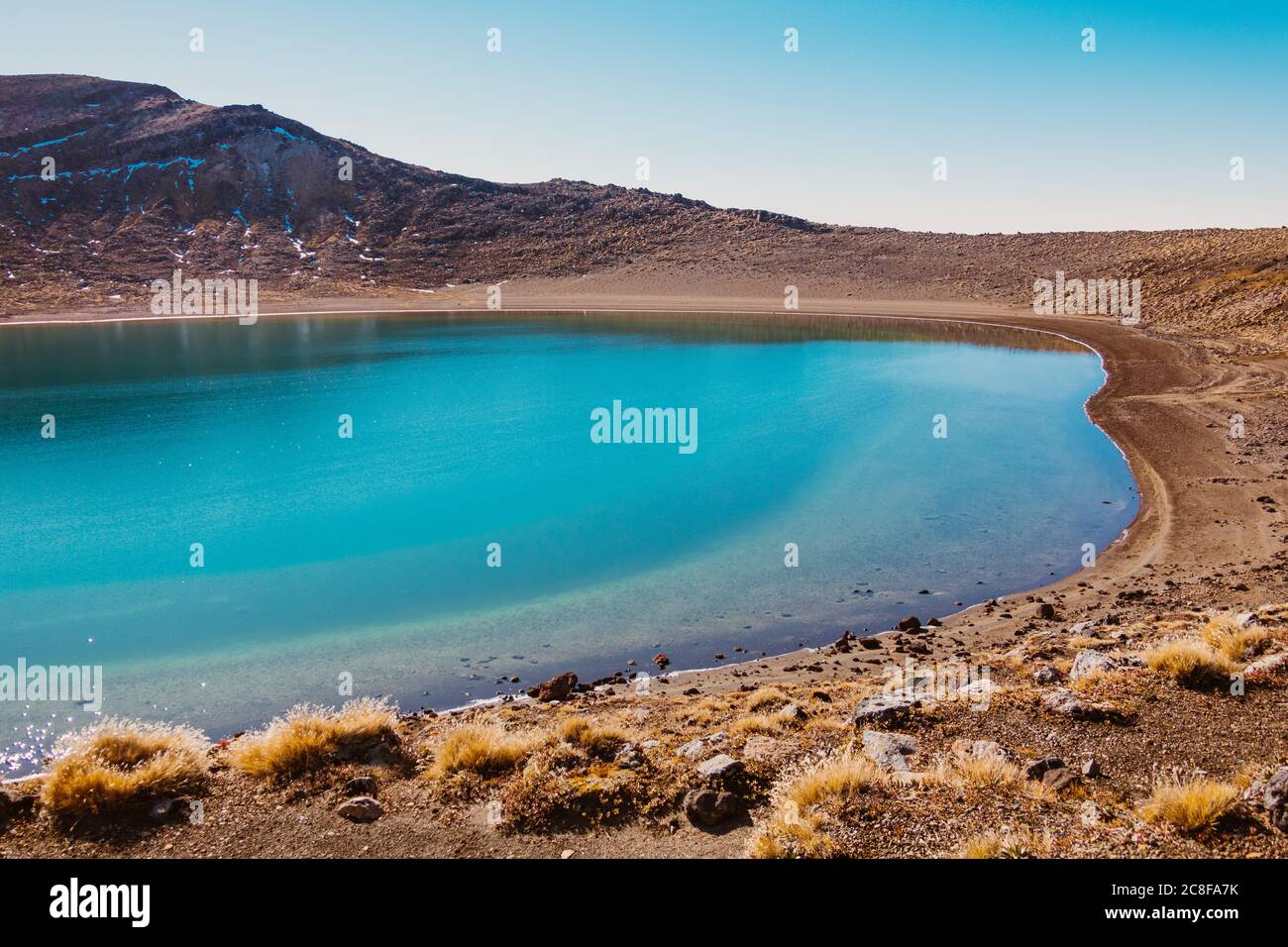 The vibrant Blue Lake on Tongariro Alpine Crossing, one of New Zealand's most popular day walks Stock Photo