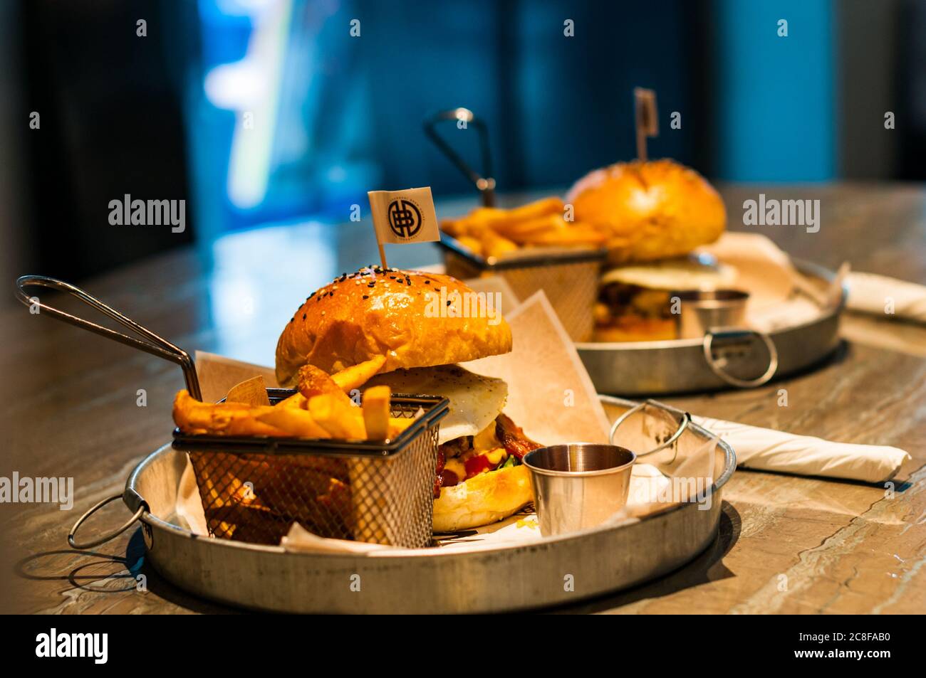 Burger and fries at Shanghai Brewhouse in Jing’an District. Stock Photo