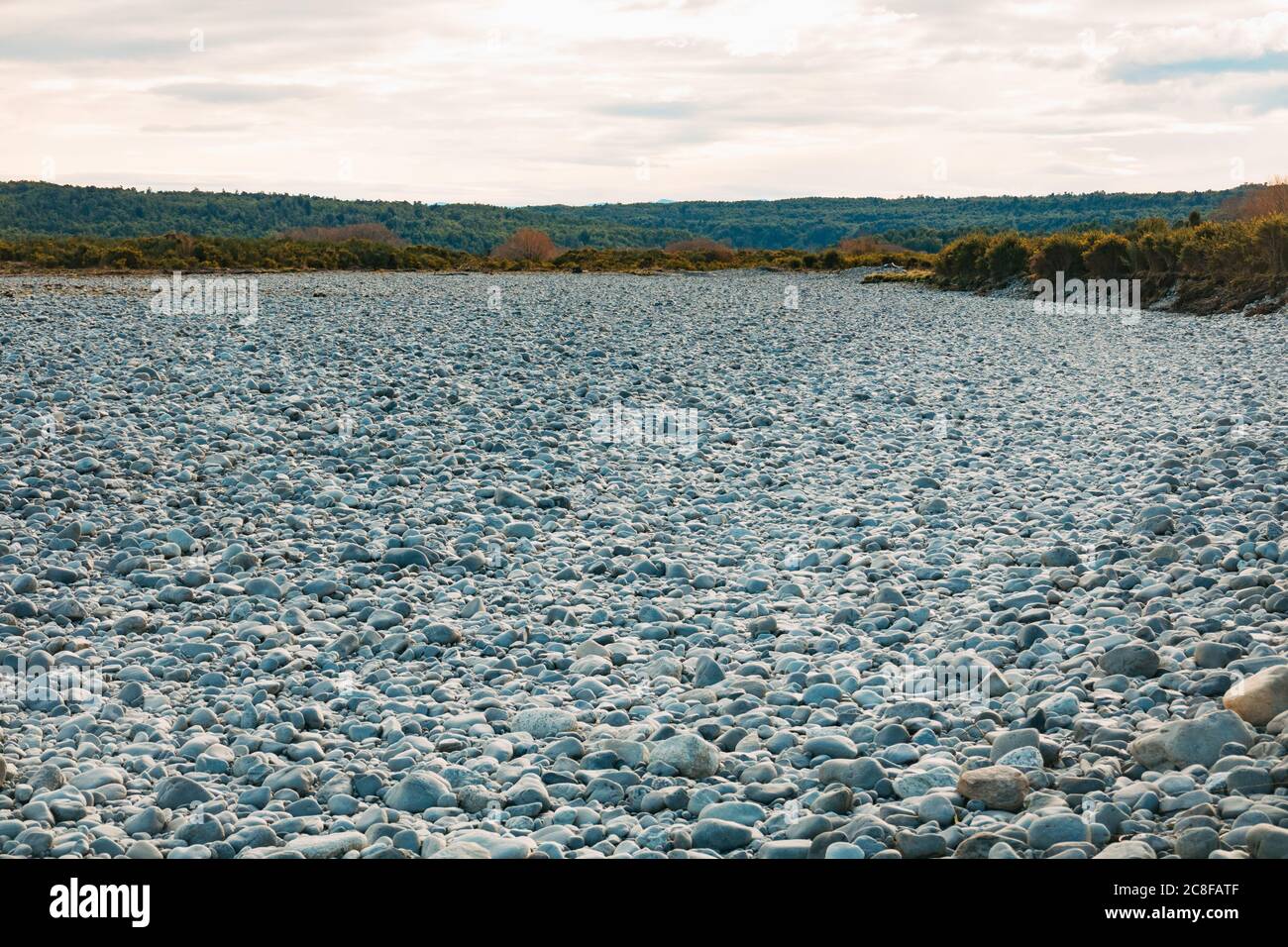 Stones on a completely dry riverbed near Ahaura, West Coast, New Zealand Stock Photo