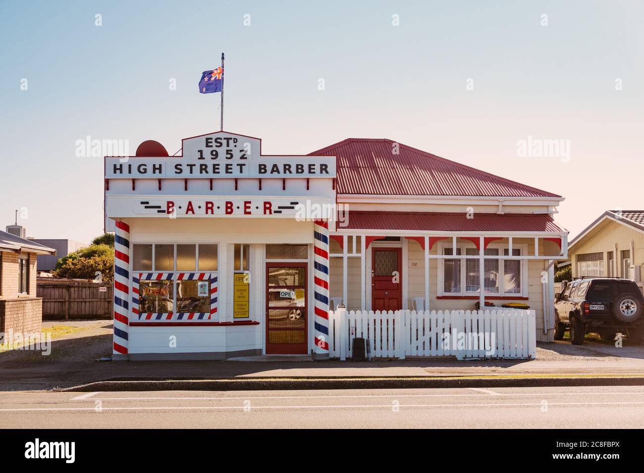 1950s style High Street Barber shop in Greymouth, New Zealand Stock Photo