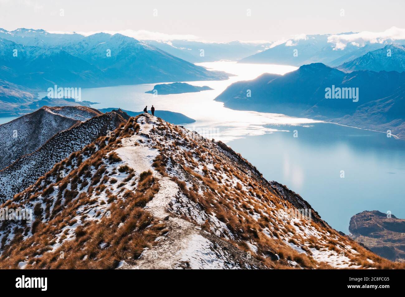 The Roys Peak Track viewpoint in New Zealand, usually seen with dozens of tourists queueing for a photo, now deserted due to the coronavirus pandemic Stock Photo