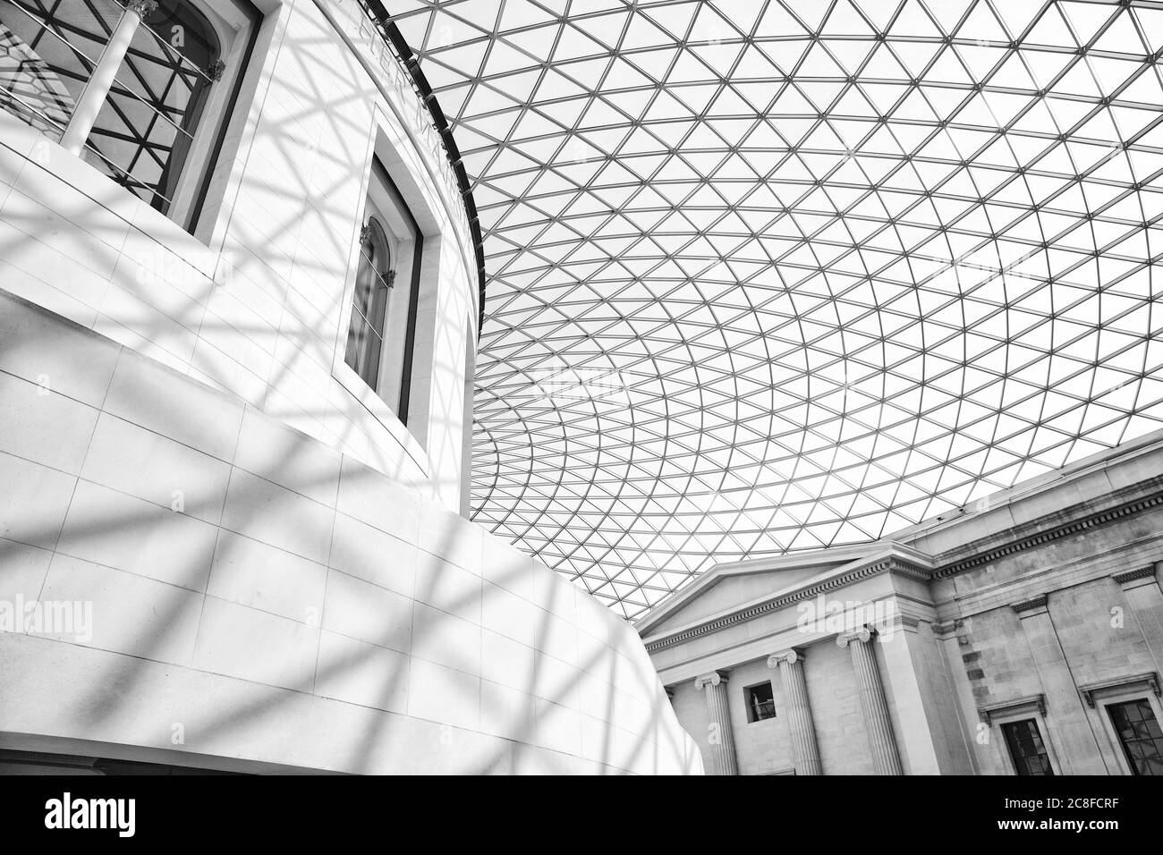 Cellular glass and steel roof structure of the British Museum Great Court in the Bloomsbury district of London UK Stock Photo