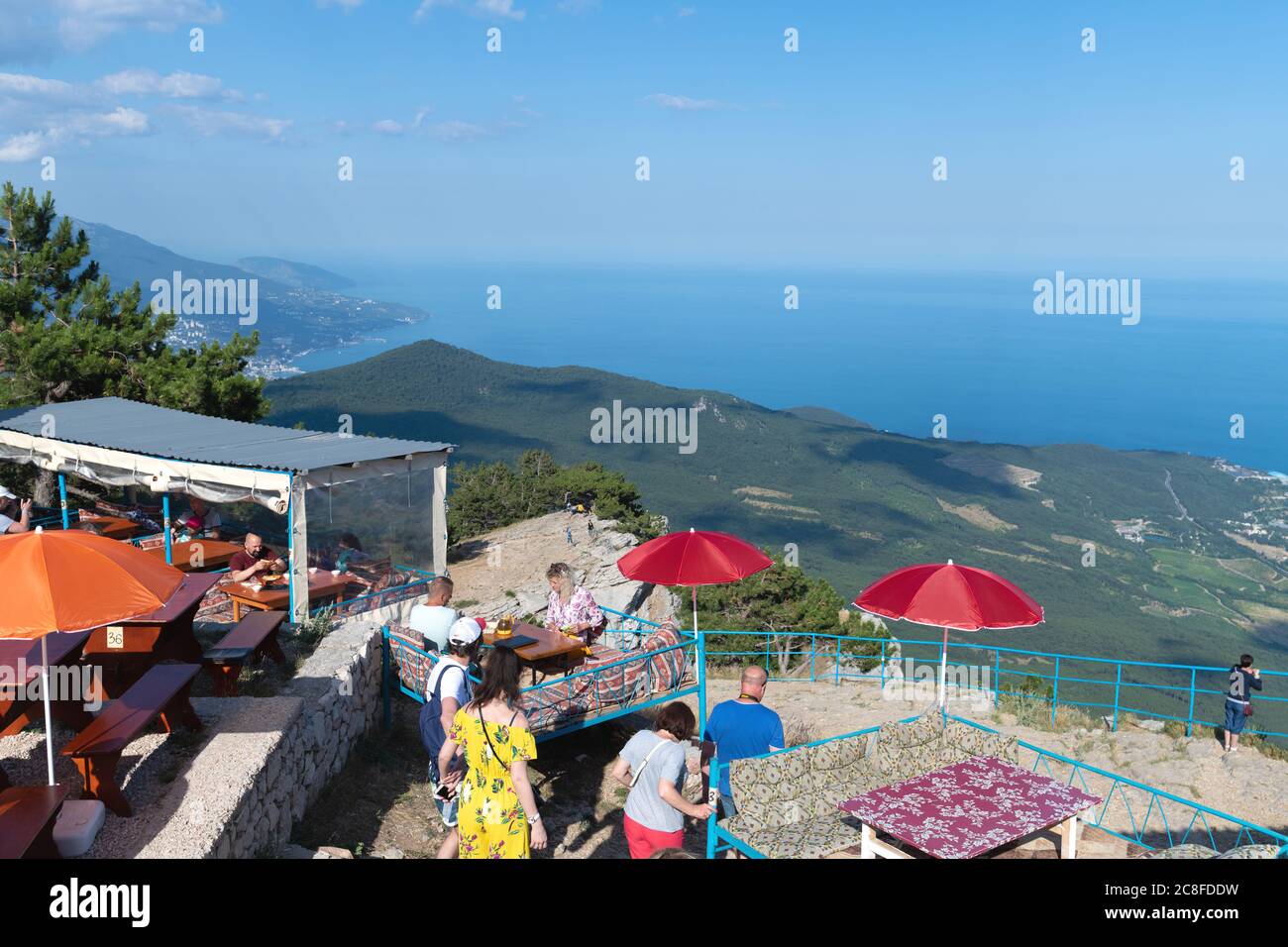 Ai-Petri, Crimea - July 5, 2019. Tourists in a cafe on the top of the mountain Stock Photo