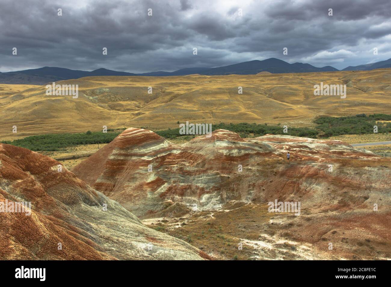 Cross-bedding in Candy Cane Mountains in Azerbaijan. Colorful stripes of the hills. Shale striped mountains. Red-pink and white striped area of Stock Photo