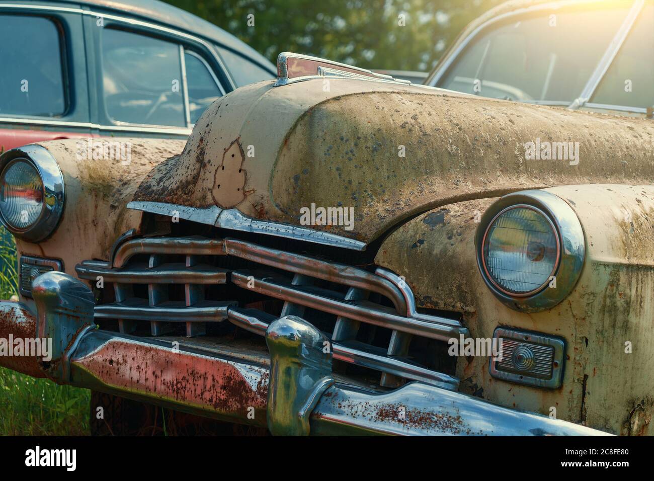 Old rusty retro vintage car with peeling paint close up, abandoned auto  Stock Photo - Alamy