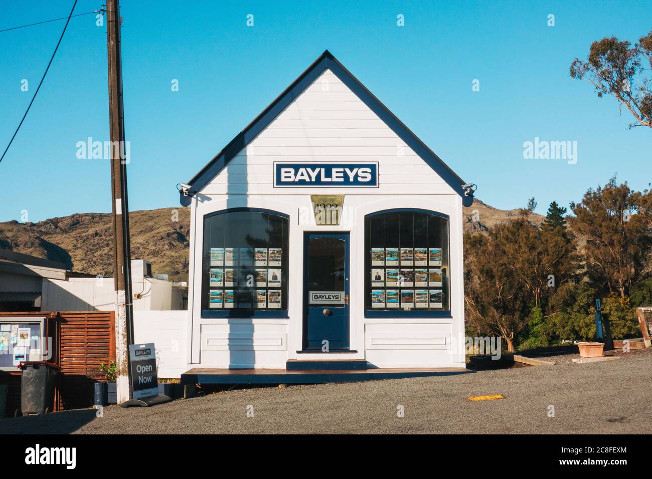 A small Bayleys real estate office in Diamond Harbour, New Zealand Stock Photo