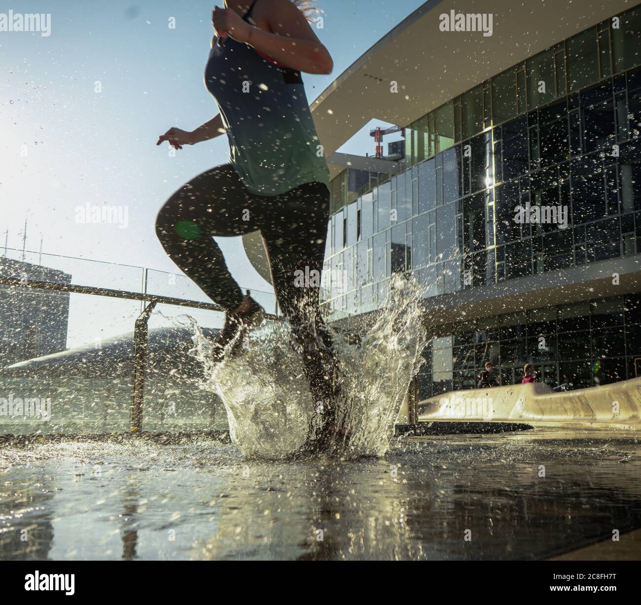 Black woman running rain hi-res stock photography and images - Alamy