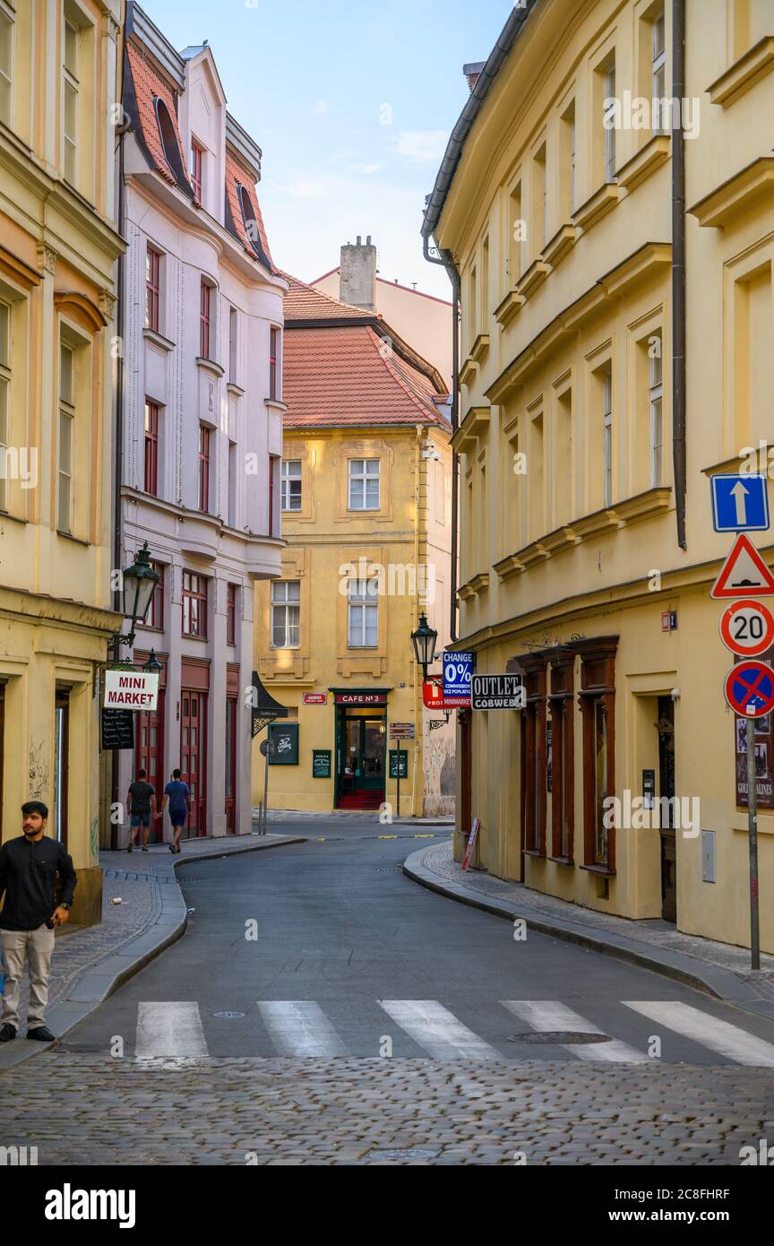 PRAGUE - JULY 20, 2019: A quiet street with zebra crossing in the old town district of Prague, Czech Republic Stock Photo