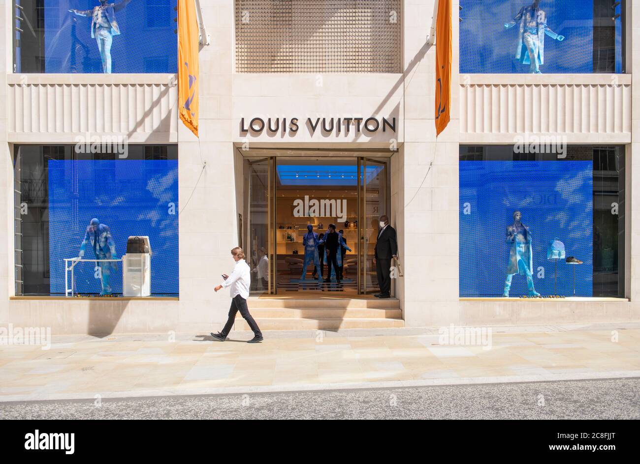 Louis Vuitton store window display and mannequins in New Bond Street in  London England UK KATHY DEWITT Stock Photo - Alamy