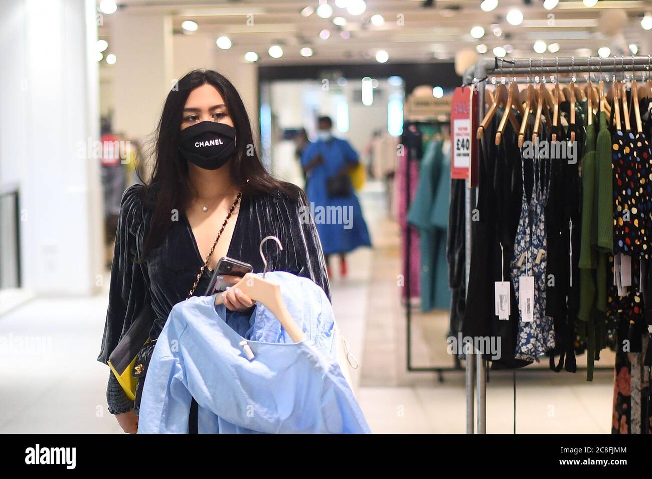 A shopper wearing a face mask in Selfridges on Oxford Street, London