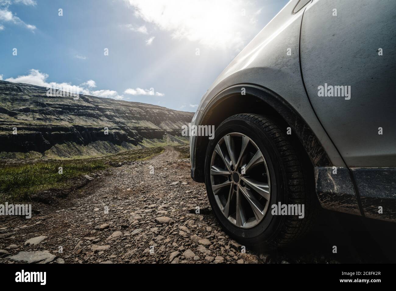 SUV vehicle car running on gravel road Stock Photo Alamy