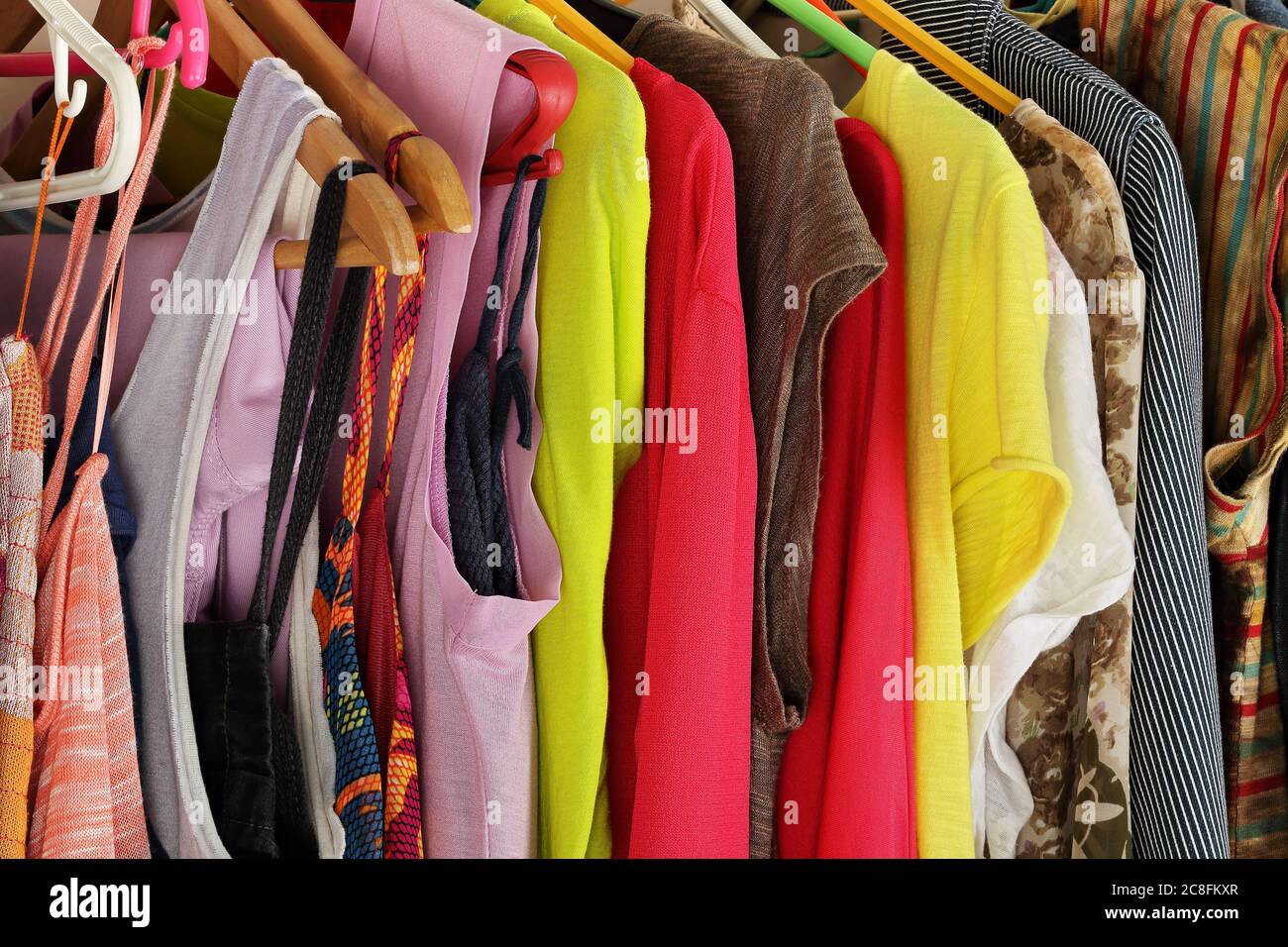 female wardrobe, collection of summer and spring clothing Stock Photo