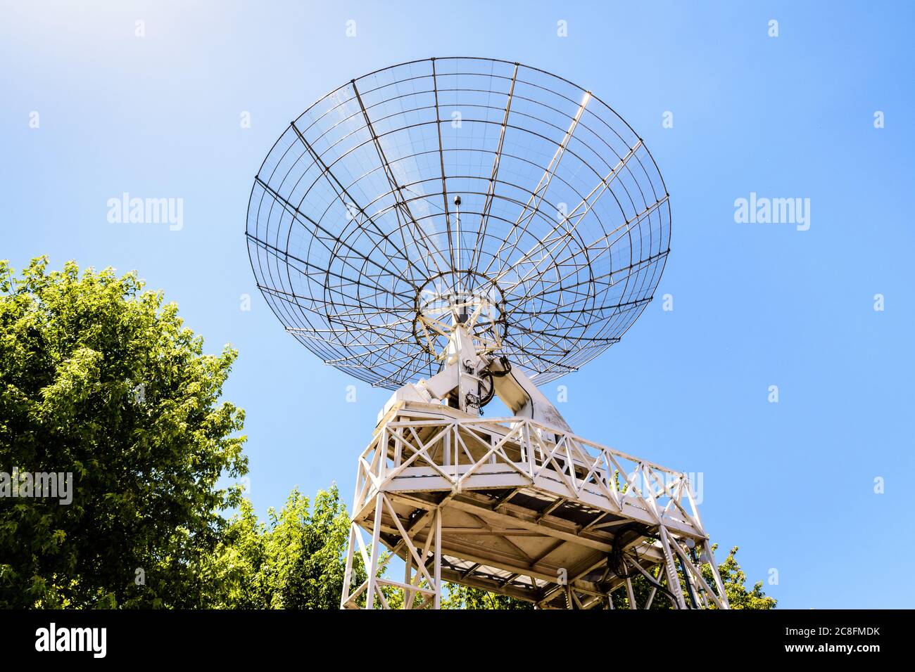 Low angle view of the 10-meter across radio telescope in the parc de la  Villette in Paris, France, against blue sky Stock Photo - Alamy