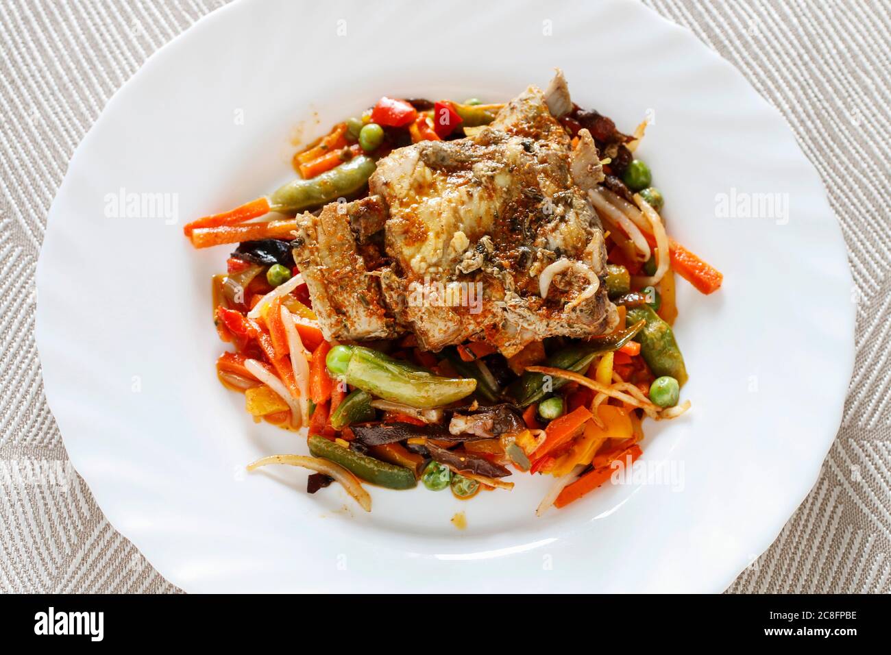 Roasted ribs with herbs and vegetables. Lunch time Stock Photo