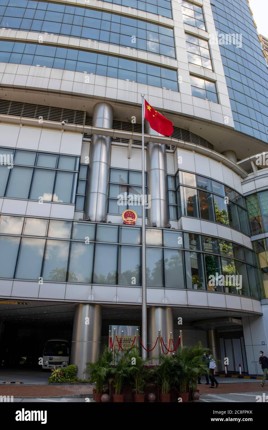 Hong Kong, China. 24th July, 2020. HONG KONG, HONG KONG SAR, CHINA: JULY 24th 2020. The National Security office takes over the MetroPark Hotel in Tai Hau to establish their office less than 2 weeks after the law came into effect. The Chinese flag and government plaques are seen on the facade.It is to be referred to as The Office for Safeguarding National Security of the Central Peoples Government of the People's Republic of China in the Hong Kong Special Administrative Region. Alamy Stock Image/Jayne Russell Credit: Jayne Russell/Alamy Live News Stock Photo