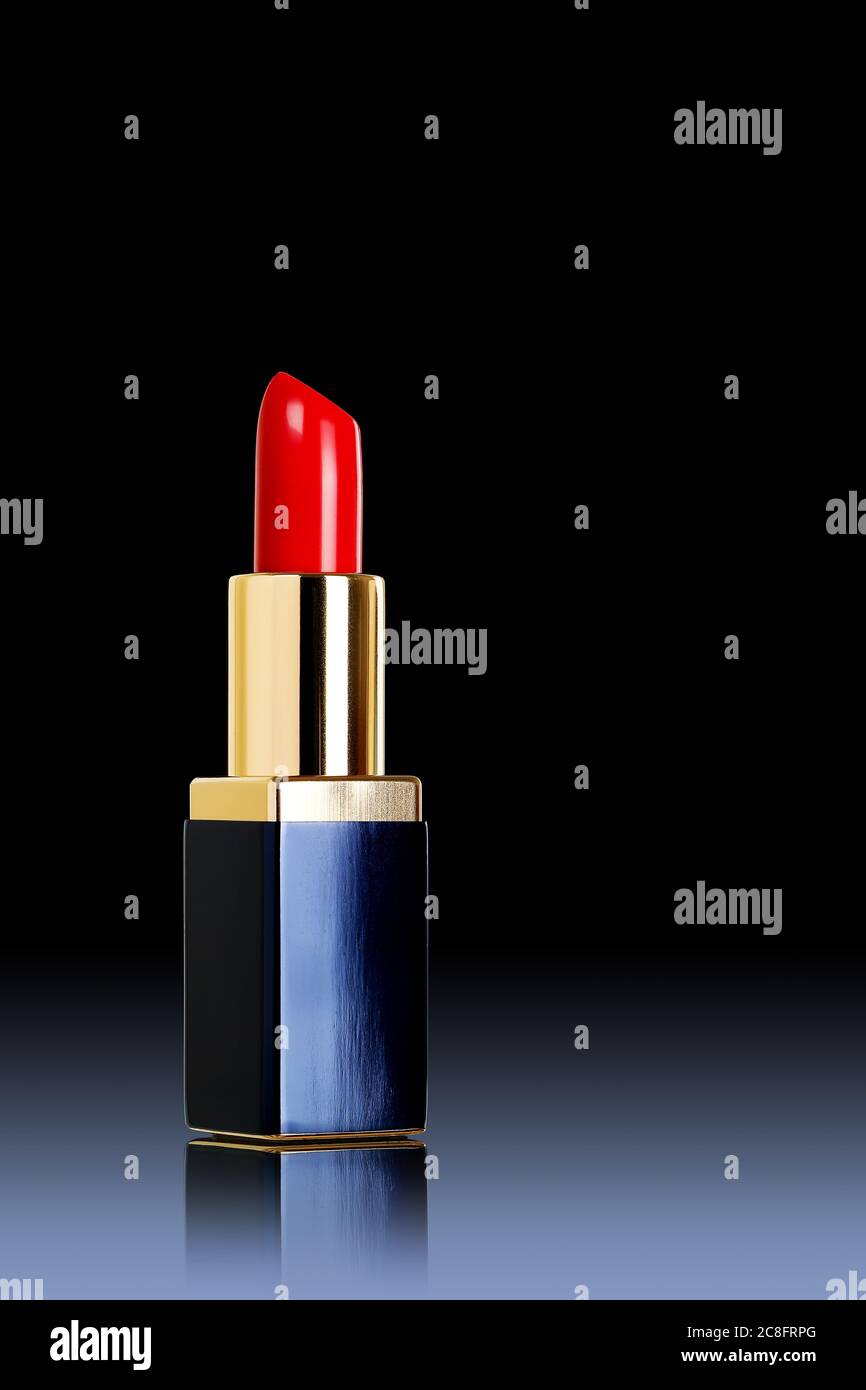 red lipstick on black background Stock Photo